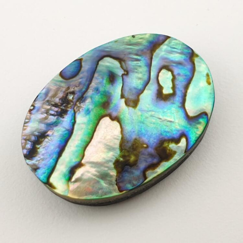 Paua abalone kaboszon 32x23 mm nr 135